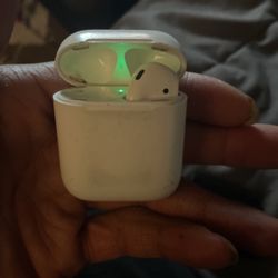 Right Apple AirPod. Charging Case Included