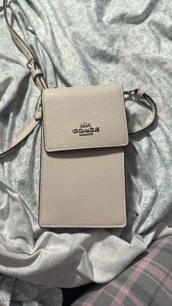 White coach phone holder