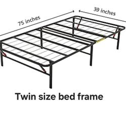 Twin size bed Amazon Basics Foldable Metal Platform Bed Frame with Tool Free Setup, 14 Inches