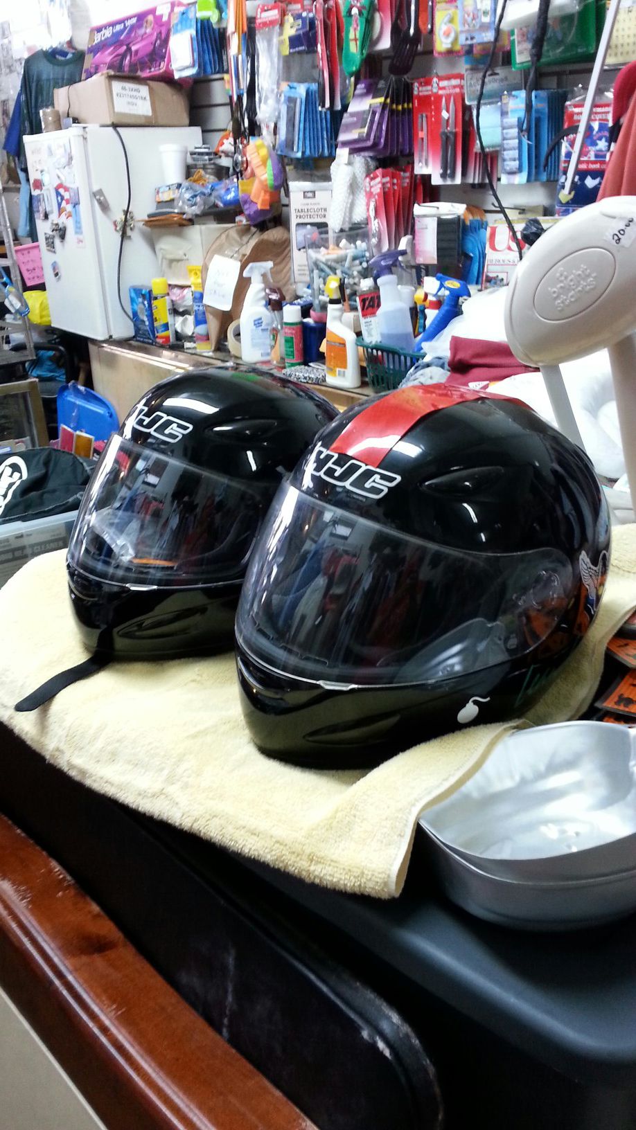2 motorcycle helmets hjc