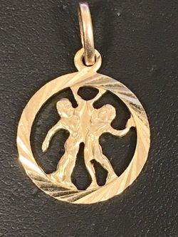 Gold charm pendant