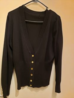 Dressy black cardigan no size tag bit fits s medium in perfect condition