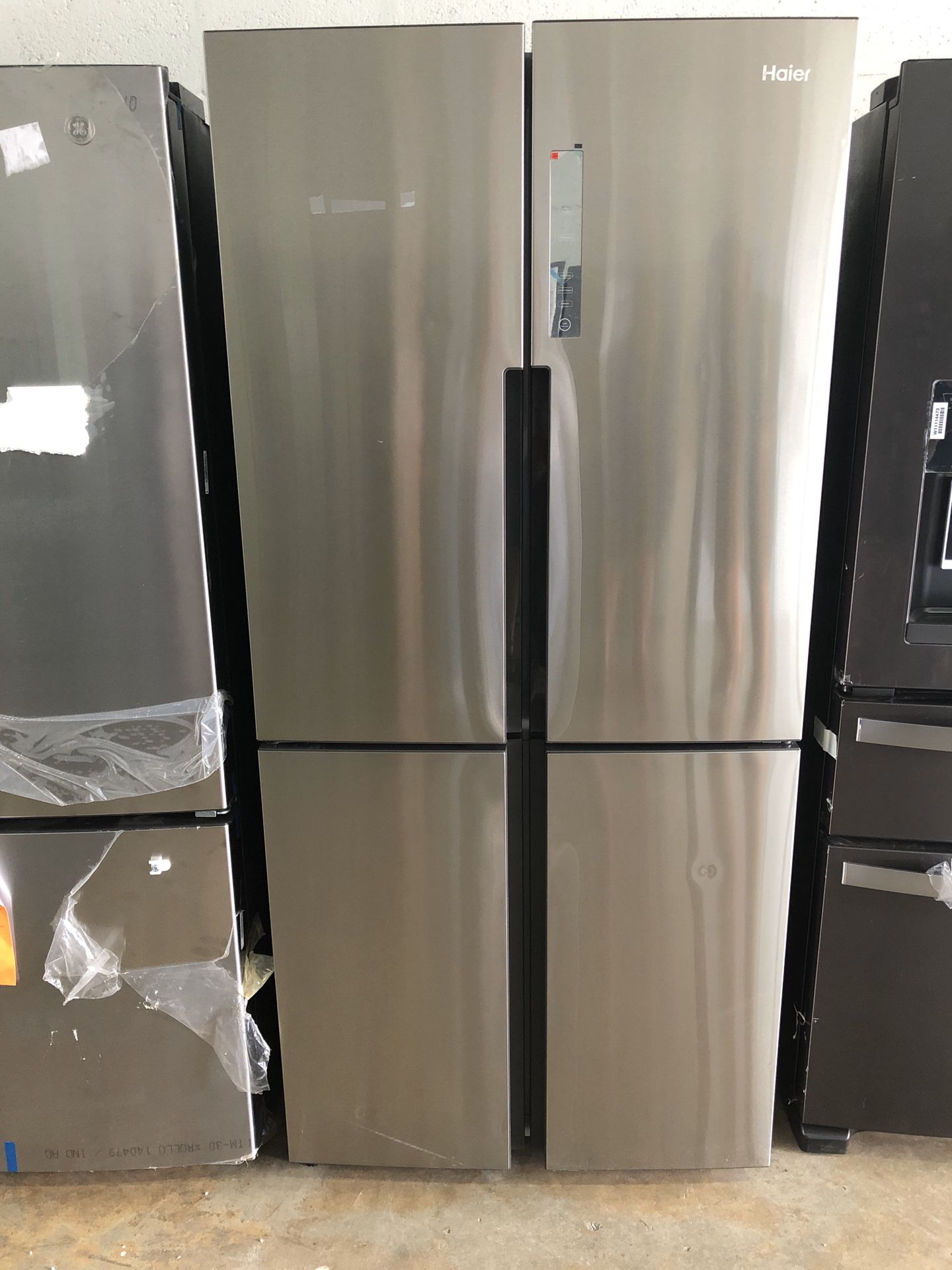 haier 33” NEW Haier 16.4 cu. ft. Quad French Door Freezer Refrigerator in Stainless Steel