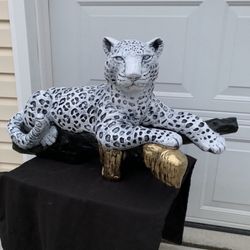 Snow Leopard On The Log  Statue