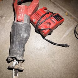 Milwaukee Sawzaw And Charger 