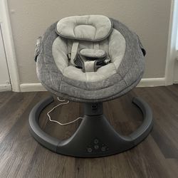Gray baby swing