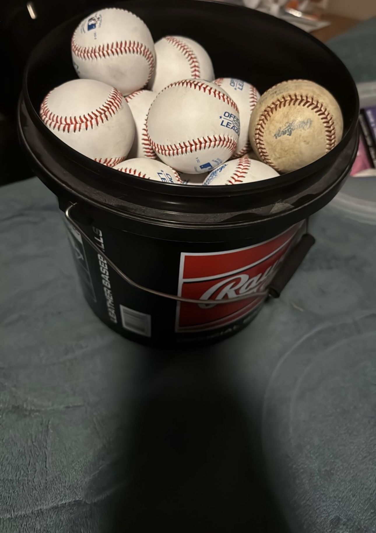 Buckets of baseballs