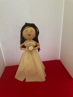 Handmade paper doll with beige dress and brown hair