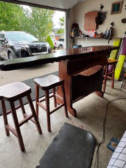 Redwood bar with live edge and stools with matching barstools all custom made