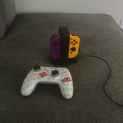 Nintendo Controllers And Charging Station 