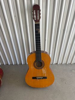 Used acoustic guitar