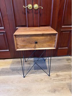 Modern wood accent table with geometric legs