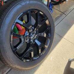 airly new Rims and Tires from my 2023 Chevrolet RST 4x4 truck. Only drove about 700 miles on them. 4 Bridgestone 275 50 22 with 4 OEM Chevy 22" wheels