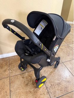 Doona stroller and car seat combo with base