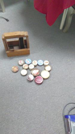 Old fashioned shoe shine box with brushes and nail polishes