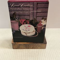 This item is a vintage hand-carved stone trinket box
