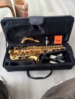 Alto Saxophone with Case and Accessories