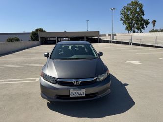 Honda Civic LX  (39 MPG)