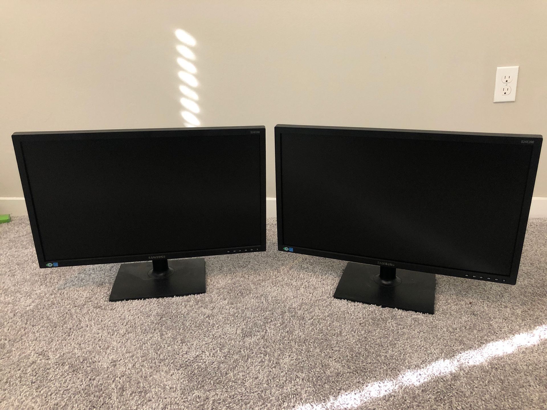 Two 24” Samsung monitors S24E200BL. Dual