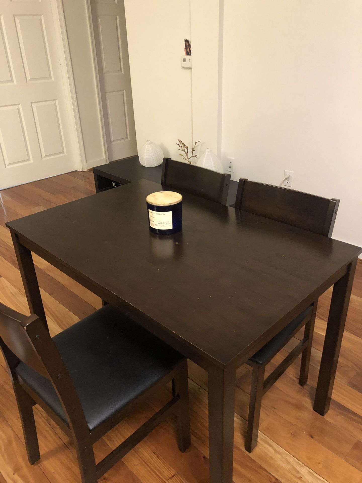 Dining table with three chairs