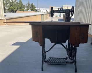 Antique New Royal Treadle Sewing Machine & Cabinet