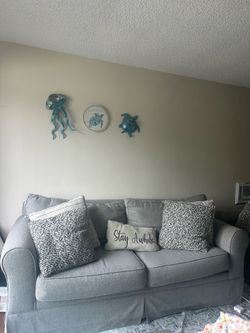 2 large sofa couches and a sofa chair
