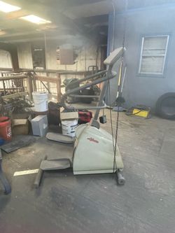 Several work out machines (home gym)