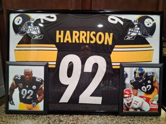 JAMES HARRISON OF THE PITTSBURGH STEELERS, CUSTOM STITCHED, BRANDED,AUTHENTIC FRAMED JERSEY.