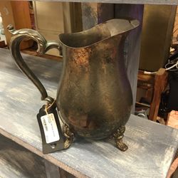 Ornate antique water pitcher