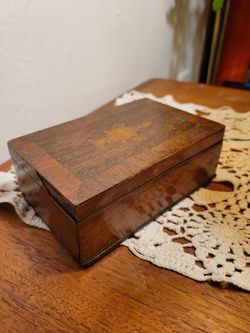 vintage wooden engraved trinket box. 