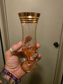 Pair of vintage gold rimmed hurricane glasses