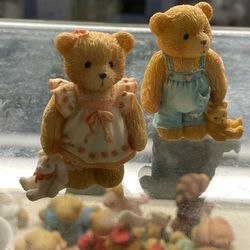 Cherished teddy boy and girl with teddy bears