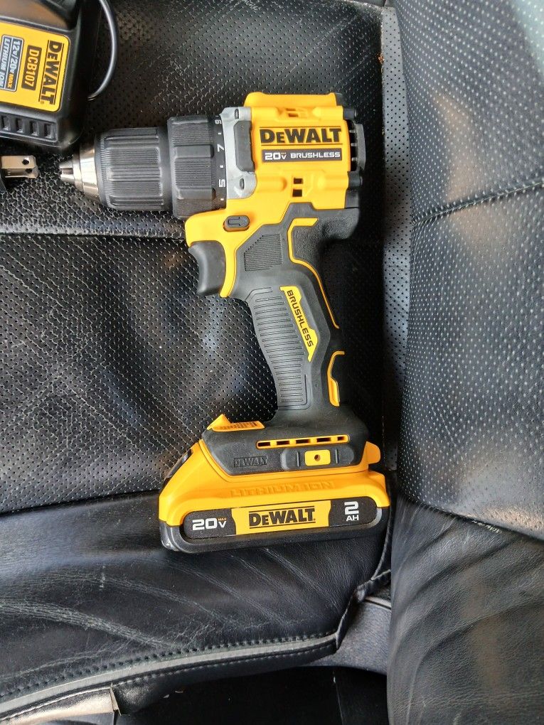 DeWalt 20V MAX Brushless Impact Driver with a 2.0 AH battery and a DCB107 charger