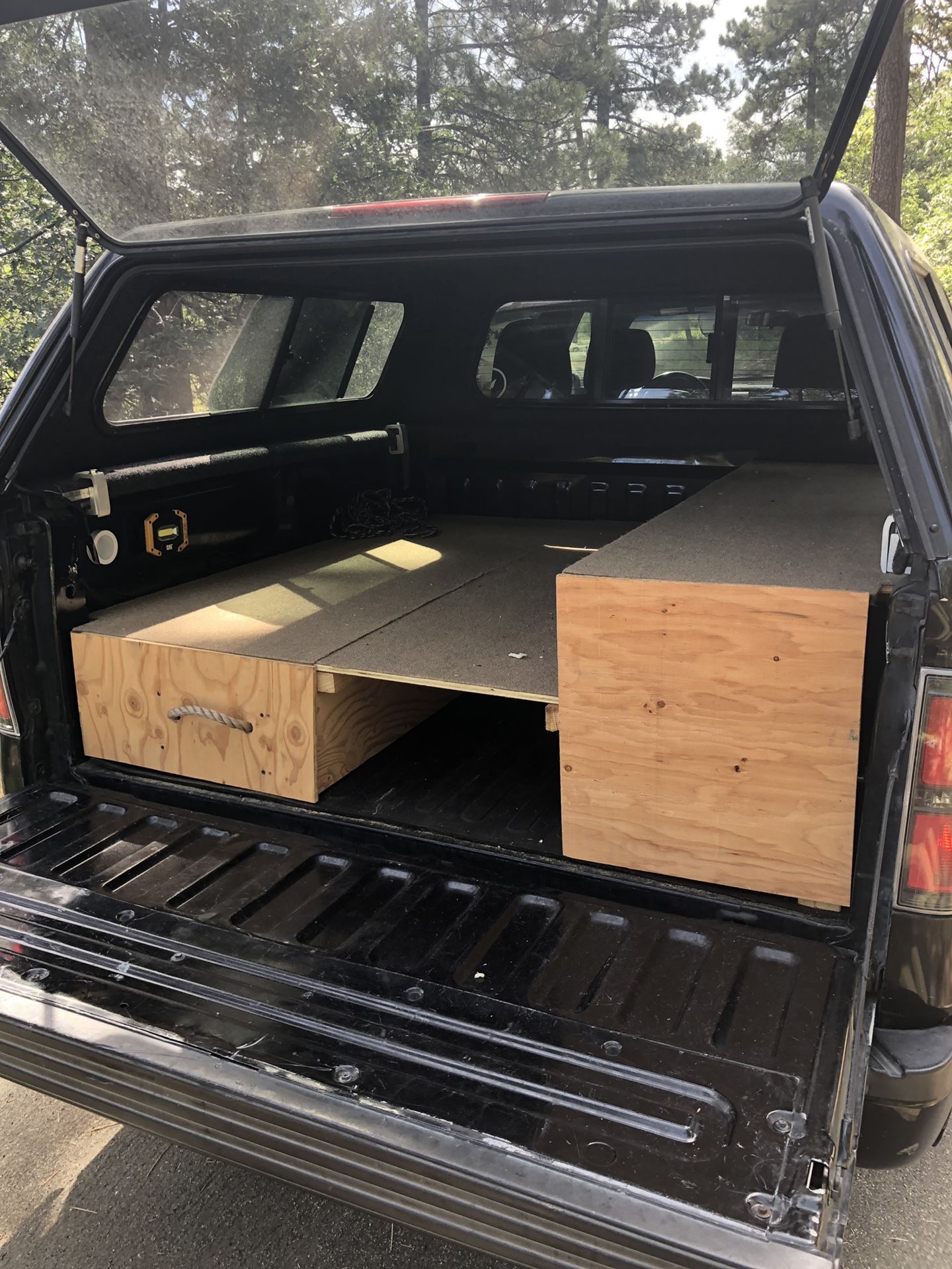 Truck camper, wooden bed