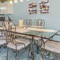 Metal and Glass table with 6 chairs