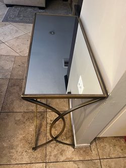 Entry metal and glass table