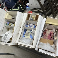 Collection of three butterfly orchid, and ruby Lena Lou dolls in original boxes Collection of three butterfly orchid, and ruby dolls by Lena Liu