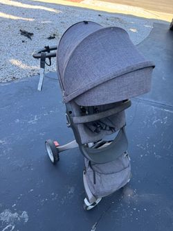 Stokke stroller with car seat + basinet