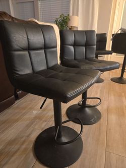 Set of 4 counter height swivel  chairs 24 inches