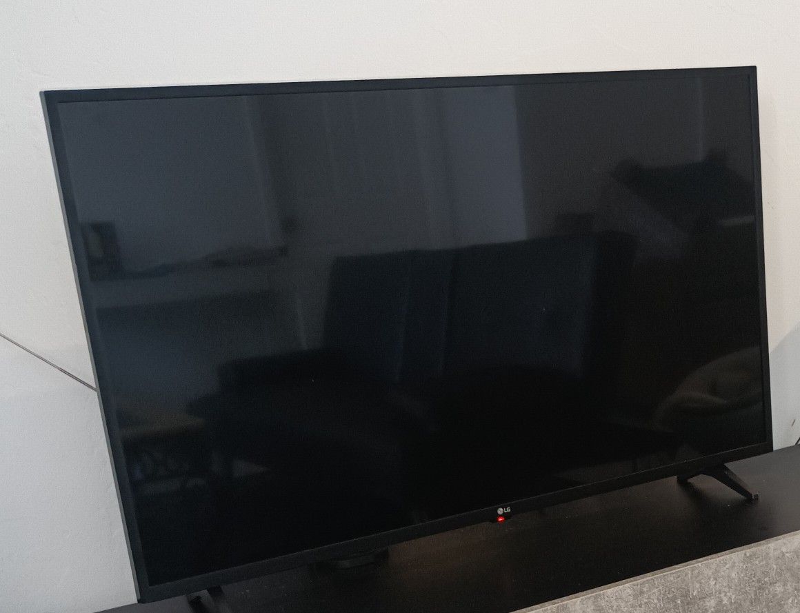 LG Smart TV @ 43" + Remote Control