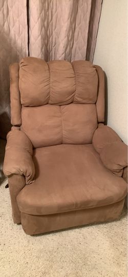 Like new, micro suede rocking recliner from a snowbird’s home with no kids, no smoking and no pets. This was in the bedroom and they only sat in it a 