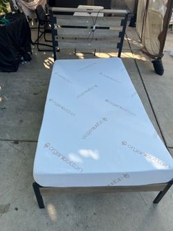 Twin bed with mattress like new