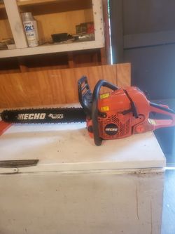 ECHO CS 590 CHAIN SAW.