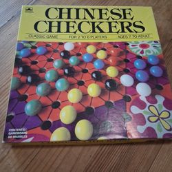 Chinese Checkers Game ,  game for 2 to 6 players, ages 7 to adult. Includes gameboard and 60 marbles.
