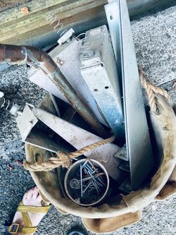 HVAC ducting, #6 nails, many metal fence brackets, sheets of metal, misc repair liquids, variety wood pieces,