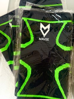 Compression knee brace green/black and orange/black - medium