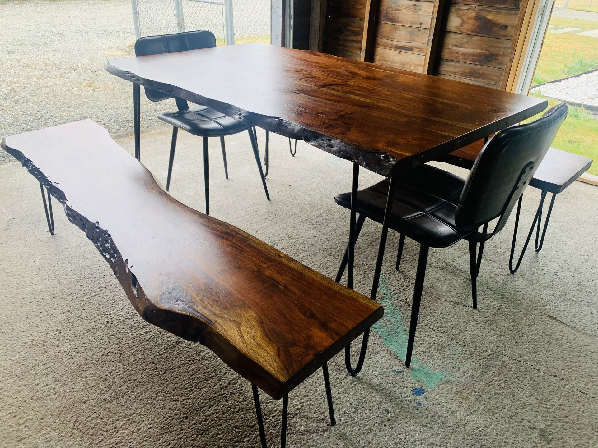 Live edge solid acacia wood dinning table, benches and chairs.