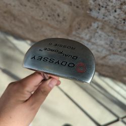  an Odyssey Dual Force Rossie II golf putter. 