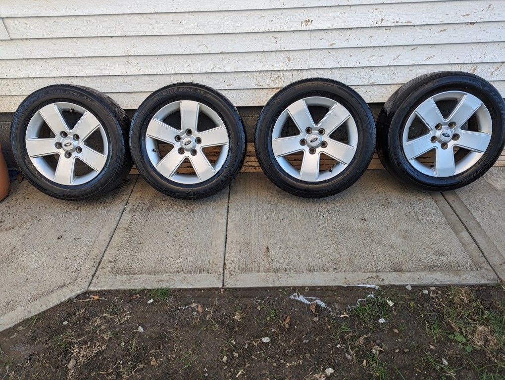 4 16 Inch Rims off a Ford Fusion Tires are bald