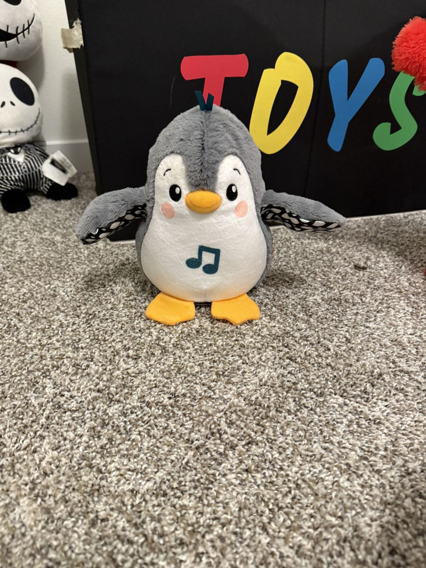 Fisher-Price Baby Tummy Time Toy Flap & Wobble Penguin, Plush with Music & Motion
